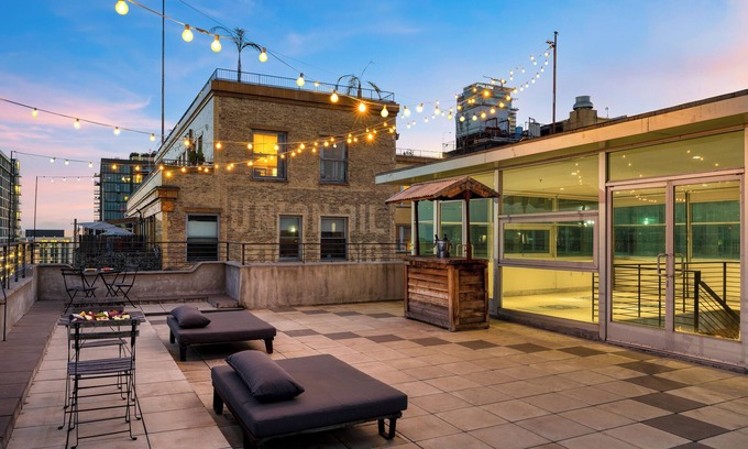 Historic Core House | Industrial-Chic DTLA Loft with Rooftop & City Views | Skyline Lofts by AvantStay