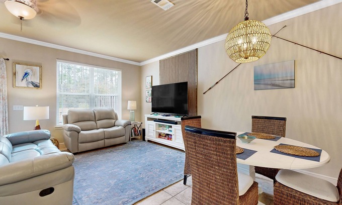 Navarre House | Inviting, two-story home with furnished patio, washer/dryer, & pool access