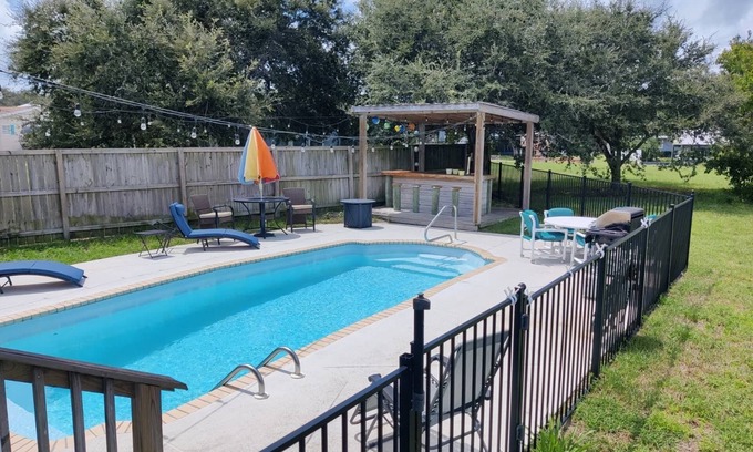 Butler Beach House | Island Escape - Water Views, Private Pool, Boat Dock, Walk to Beach