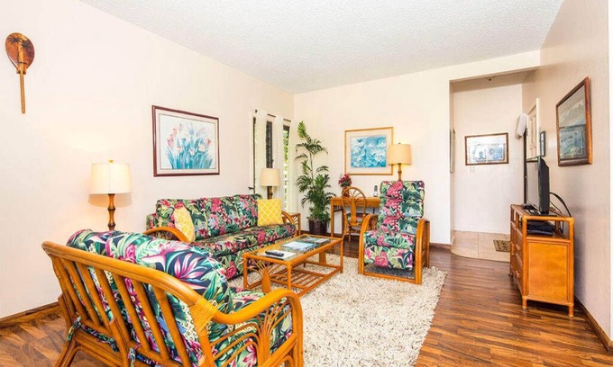 Lihue Condo | Island Touches w/Modern Kitchen, Wood Floors, Lanai, Flat Screen, WiFi–Kaha Lani 203