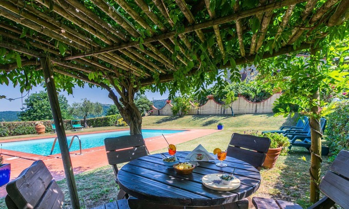 Castelnuovo di Val di Cecina Apartment | Lovely apartment for 4 guests with pool, A/C, WIFI, TV, patio and pets allowed