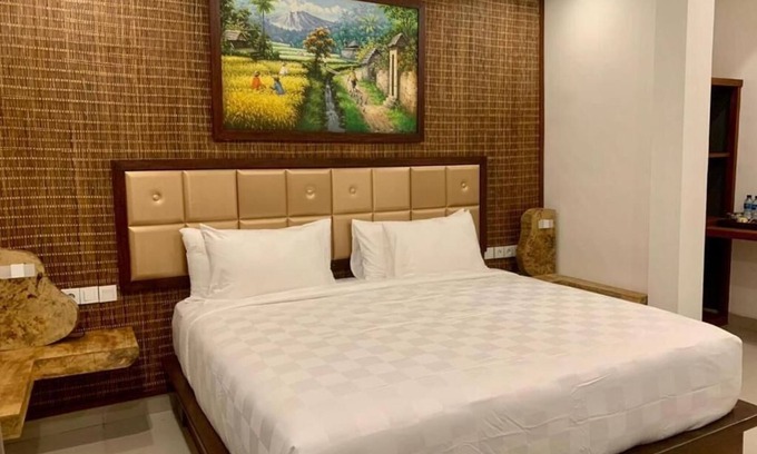 Peliatan Bed & Breakfast | King Room with Garden View at Mandala Home Stay
