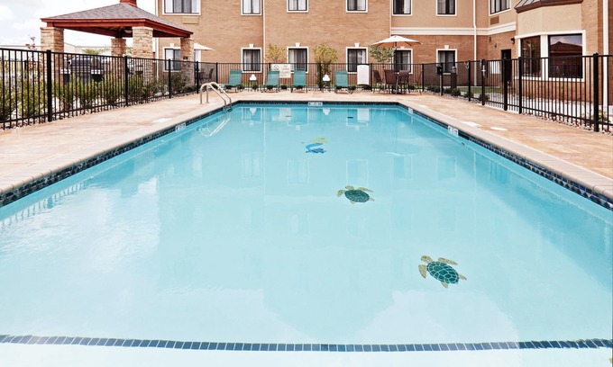 Oklahoma City Condo | King Suite. Free Breakfast Buffet Daily. Outdoor Pool.