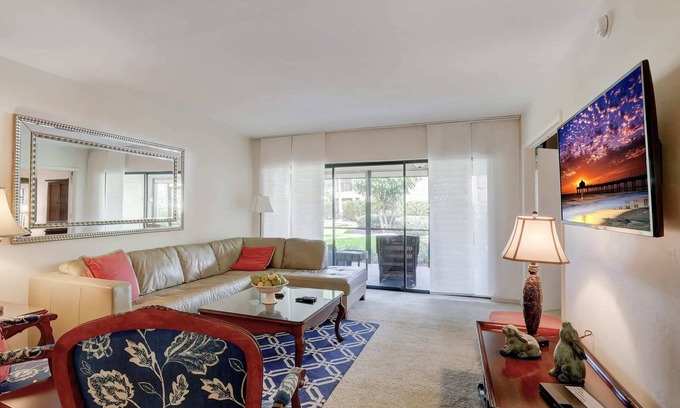 Kings Lake Condo | Kings Lake First Floor Corner Condo with 2 Lanais and Walk to the Community Pool