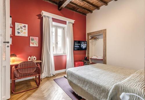 Monti Apartment | La suite Rossa del Colosseo