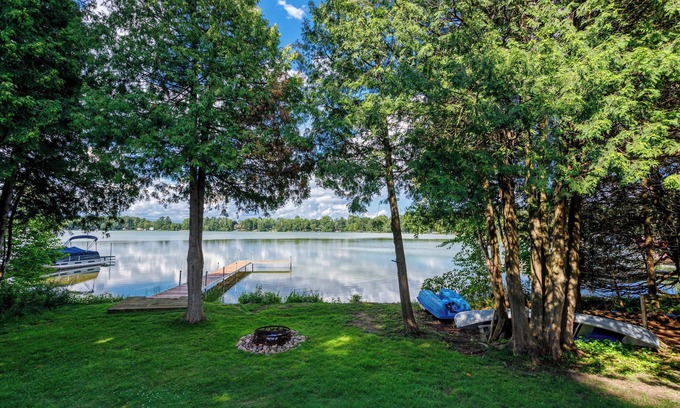 Galloway Cottage | Lake Helen Waterfront Retreat with fire pit and dock