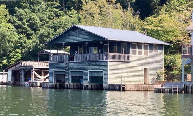 Tuxedo House | Lake Summit house and boathouse stocked with all the fun stuff.