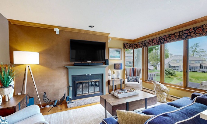 Gilford House | Lake-view townhome with lakefront swimming, pools, fireplace, tennis/pickleball