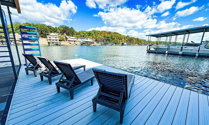 Sunrise Beach House | Lakefront 3BR, 2BA home in coveted cove near Margaritaville and Paradise. Features private dock with sundeck, decks with grill and firepit, gourmet kitchen, kayaks, WiFi, and pet-friendly fun. Quiet Cove minutes from the Action.