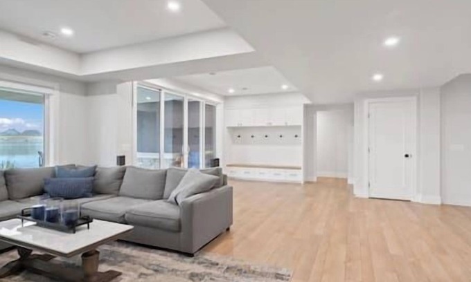 Southeast Calgary House | Lakefront | 4 Bedroom | Gym + Theatre + Garage |