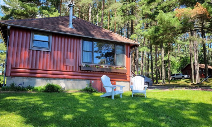 Arbor Vitae Cabin | Lakefront Cabin with private dock, community firepit, with kayaks & paddleboards