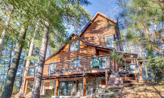 Eagle River Cabin | Lakefront cabin with WiFi, W/D, fireplace, furnished deck, firepit, & dock