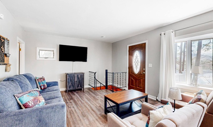 The Bays House | Lakefront four season home w/private beach, boat slip, dock, & fishing kayaks