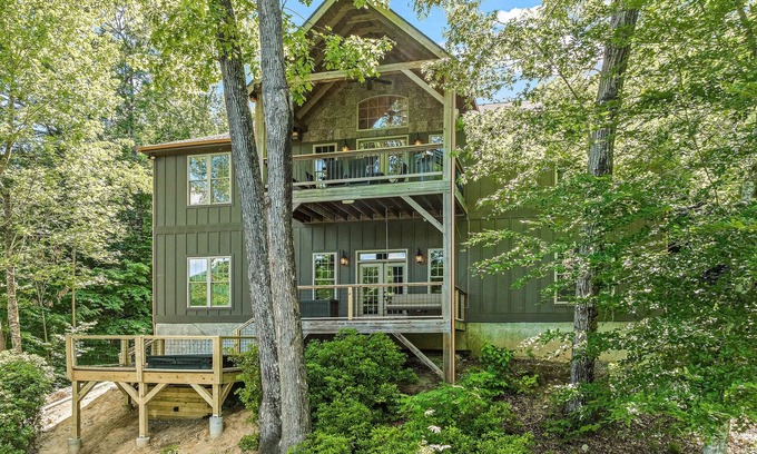 Lake Lure House | Lakefront retreat with private beach, games, dock & kayaks