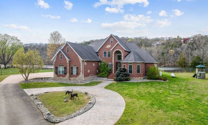 Branson Apartment | Lakeshore Hideout: Spacious Family Retreat with Private Dock & Prime Trout Fishing!