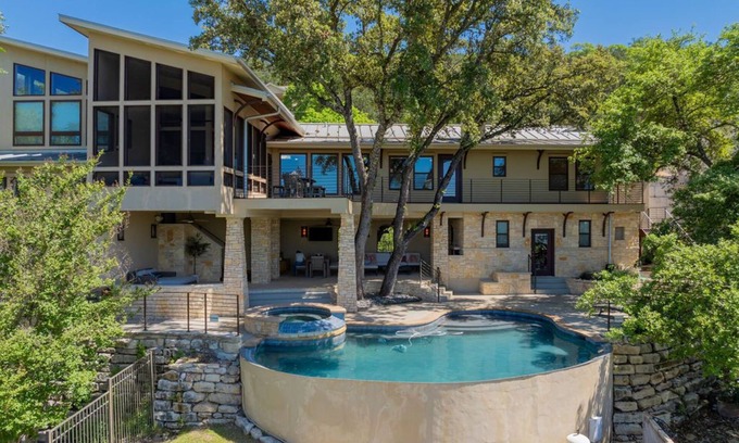 Lago Vista House | Lakeside Luxury with Infinity Pool, Expansive Decks & Stunning Lake Views