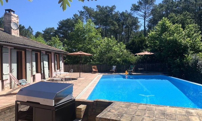 Ychoux Villa | Landes house sleeps 13 Airial swimming pool tennis bowling green near lake & ocean