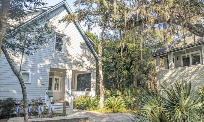 Cape Fear Station House | Large deck on main level and screened in porch, private crofter; access to both clubs!