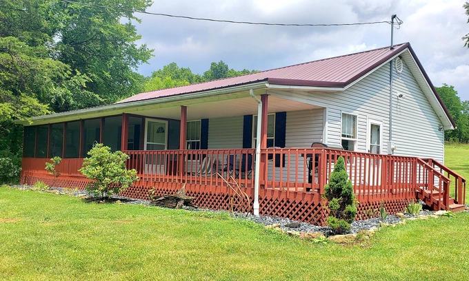 Langsville House | Large Farm Cabin with Private Pond in the middle of Cow Fields & Wildflowers