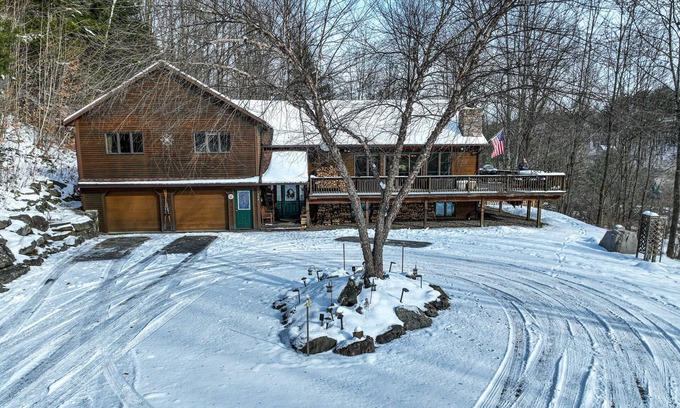 Stowe Area House | Large home surrounded by trees with wraparound deck & fireplace - near slopes