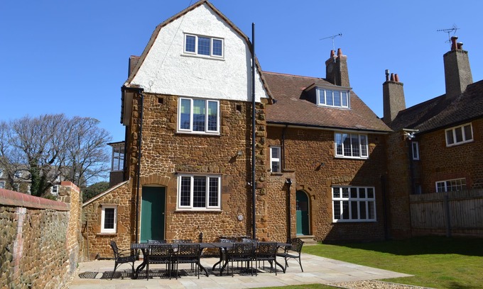 Hunstanton House | Large house with sea views, ample off-road parking, enclosed garden with terrace