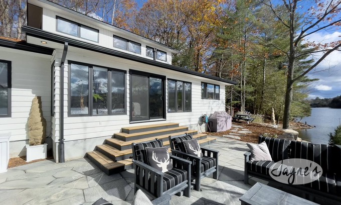Lake of Bays Cottage | Large party Dock! Lush Luxury! Hot Tub! Sandy Beach! Southern Exposure!