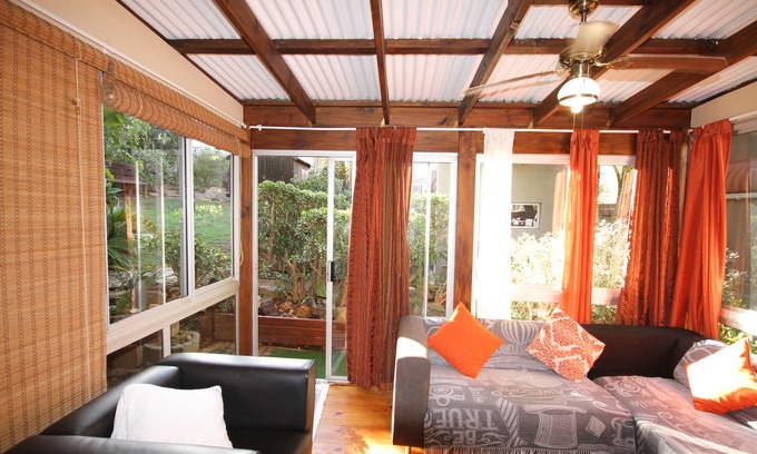 Wavecrest Cottage | Lazybay cottage set in a quiet garden in walking distance to the beach and shops