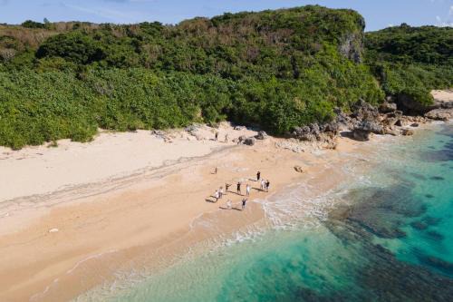 Uruma Hotel | LivingAnywhere Commonsうるま twin bed room - Vacation STAY 88989v