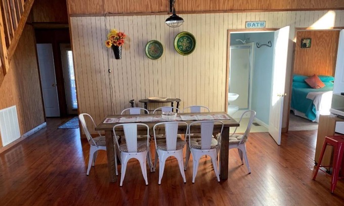 Calico Rock House | Lockie Lodge, rustic A frame style home with open concept.