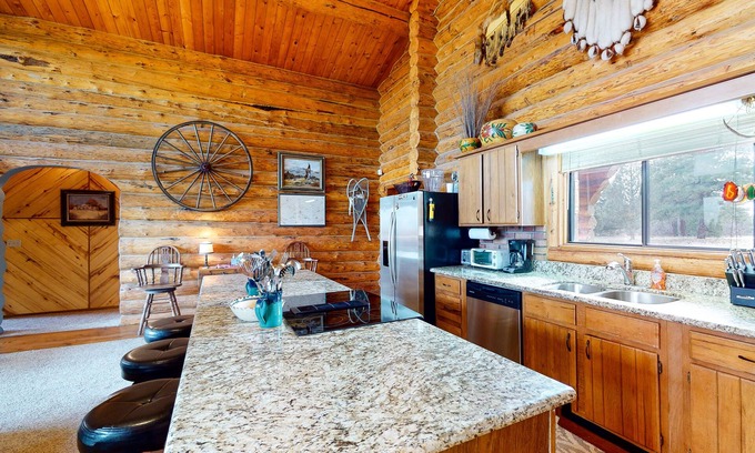 Pagosa Springs House | Log home with firepit, deck, & mountain view - dogs OK