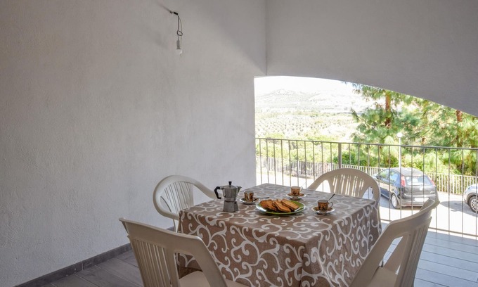 Santa Maria del Mare Torrazzo Apartment | Look forward to a beautiful view of the sea in this beachfront vacation rental.