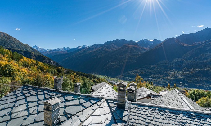 Cheverel Apartment | Look forward to a vacation in this charming vacation apartment with a view of the northern Italian m