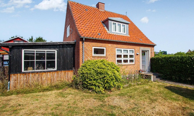 Tranebjerg House | Look forward to many pleasant hours on the terrace of this vacation home.