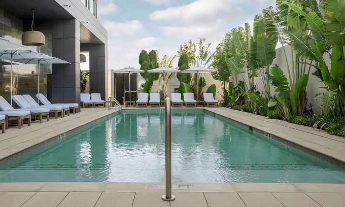 Florida Central Atlantic Coast Hotel | Look No Further! 2 Exquisite Units, w/Outdoor Pool, Shuttle Service, Parking!