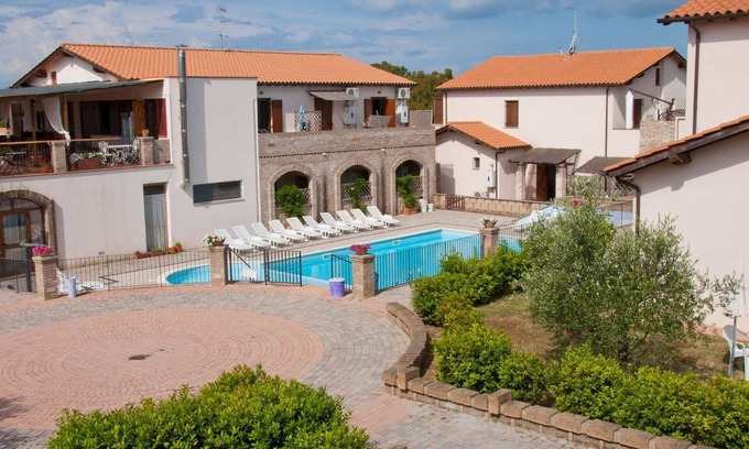 Follonica Apartment | Lovely apartment for 4 people with pool, A/C, TV, patio and pets allowed