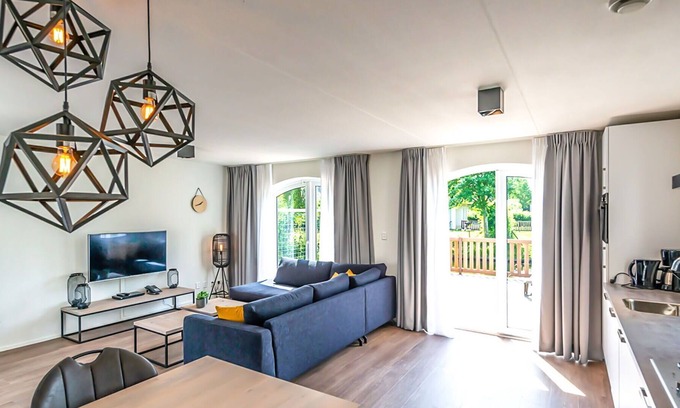 Municipality of Hellevoetsluis House | Lovely apartment in villa for 4 guests with pool, WIFI, TV, terrace and parking