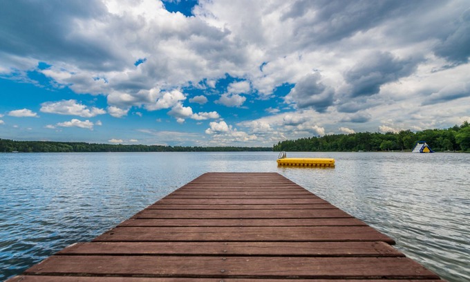 Eagle River House | Lovely lakefront gem with private dock, large deck, & free WiFi - dog-friendly