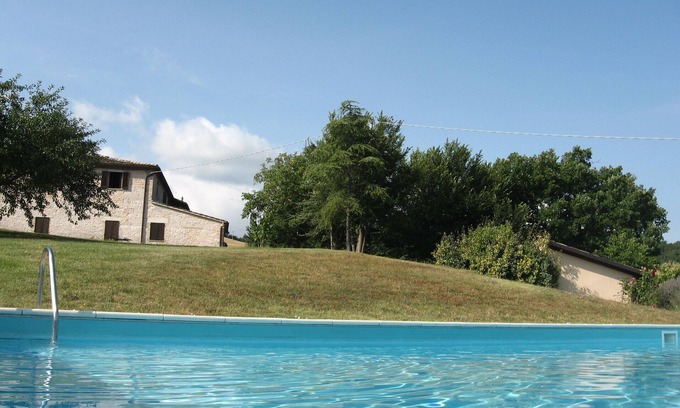 Cagli Apartment | lovely panorama, pool and valley view, equipped with kitchenette.