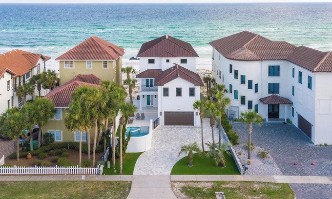 Destiny Shores House | Luxurious Beachfront Retreat: Pool, Spa, Chefs Kitchen