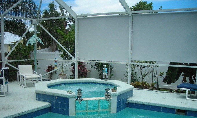 Port Saint Lucie House | Luxurious two -bedroom house with third bedroom option salt water pool, hot tub