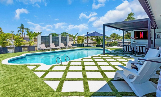 Dana Shores House | LUXURY 4BR Private Pool & Hot Tub, Dock, Bay Access! Sleeps 10- Games & Scooters