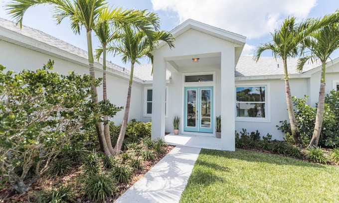 Cape Caneveral Beach Gardens House | Luxury Coastal Home - Steps to Beach w/Private Backyard, Hot Tub & Games Room!