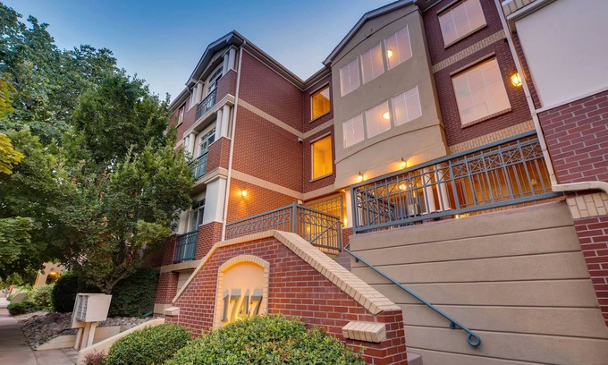 Uptown Condo | Luxury Executive Suite Suite overlooking the skyline!