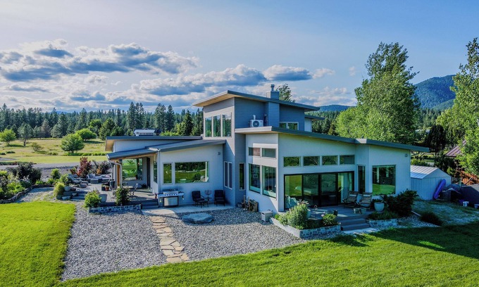 Libby House | Luxury Home on the Kootenai River with Panoramic Cabinet Mountain Views