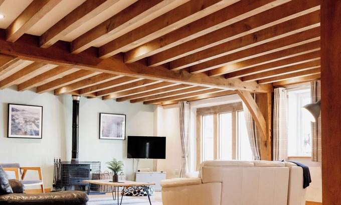 Devils Bridge House | Luxury renovated barn with a large hot tub and games room. Sleeping 16