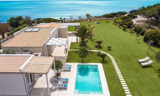 Santa Maria del Focallo Villa | Luxury villa with pool, beach front, Porto Ulisse