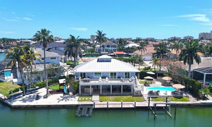 Marco Island House | Luxury Waterfront Pool Home, Walk to Beach, Kayaks SUP's, Bikes, Pool/PPong Tbl