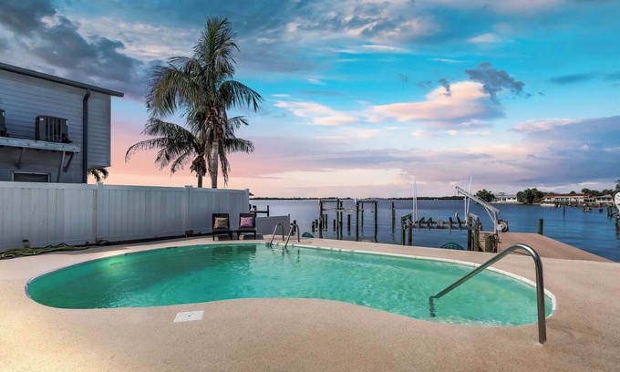 St. Petersburg - Clearwater House | Luxury Waterfront Farmhouse Retreat w/Saltwater Pool, Dock & Tiki Bar
