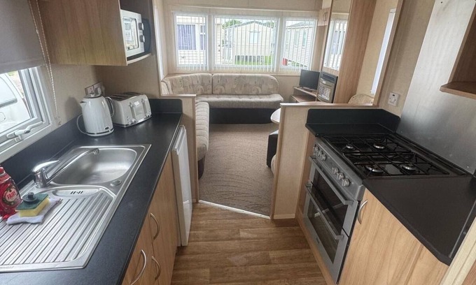 Towyn Ski Chalet | Lyons Oakfields, Towyn, 3 Bedroom, pet Friendly