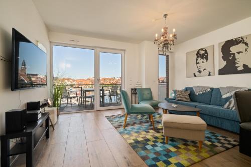 Muritz Apartment | Müritz Utkiek - Apartment mit Seeblick & Balkon in der Hafenresidenz